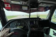 Interior view of a Peterbuilt truck showing fresh painted parts