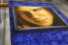 Display panel showing off Mitch's skills in portraiture