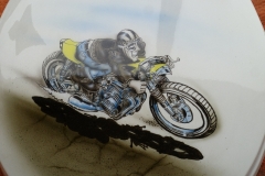Closer shot of the racing motorcycle toilet seat lid